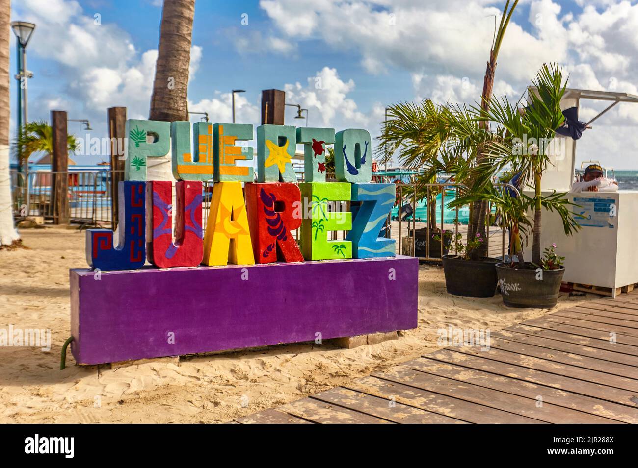 Colorful sign of Puerto Juarez where you can take the ferry to Isla