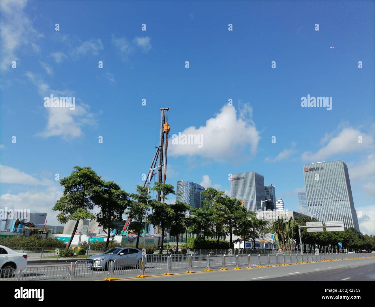 Shenzhen, China road traffic and construction site landscape in Bao'an