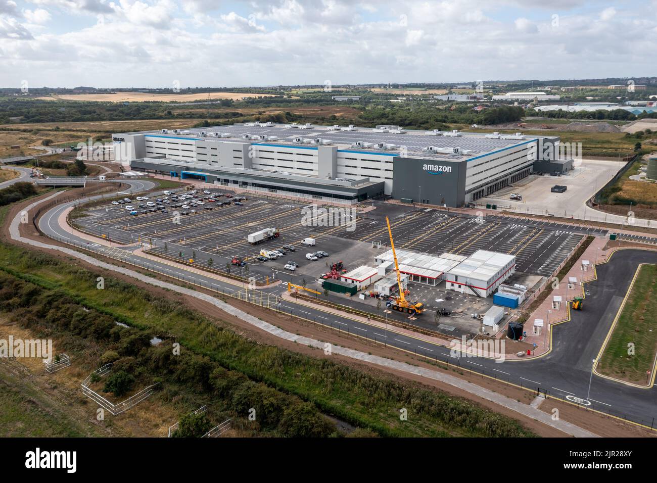 LEEDS, UK - AUGUST 19, 2022. Aerial view of a large Amazon Prime distribution warehouse at Gateway 45 near the M1 motorway in Leeds, UK Stock Photo