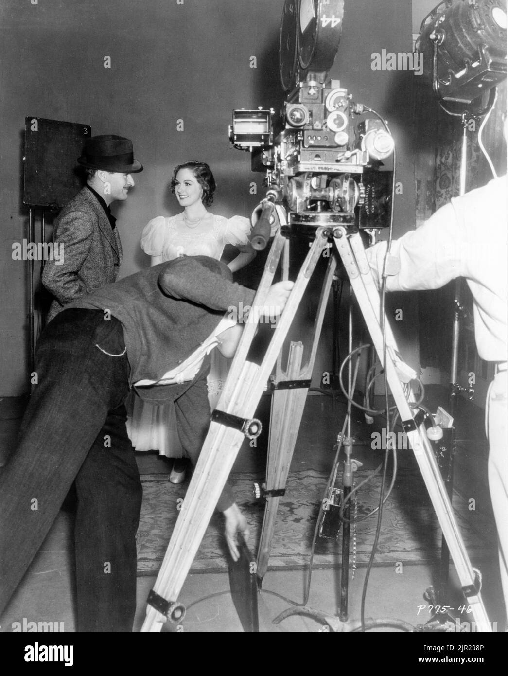 Director WILLIAM A. WELLMAN with actress SUSAN HAYWARD on set candid during her successful screen test for the role of Isobel Rivers opposite Gary Cooper in BEAU GESTE 1939 director WILLIAM A. WELLMAN novel P.C. Wren Paramount Pictures Corporation Stock Photo