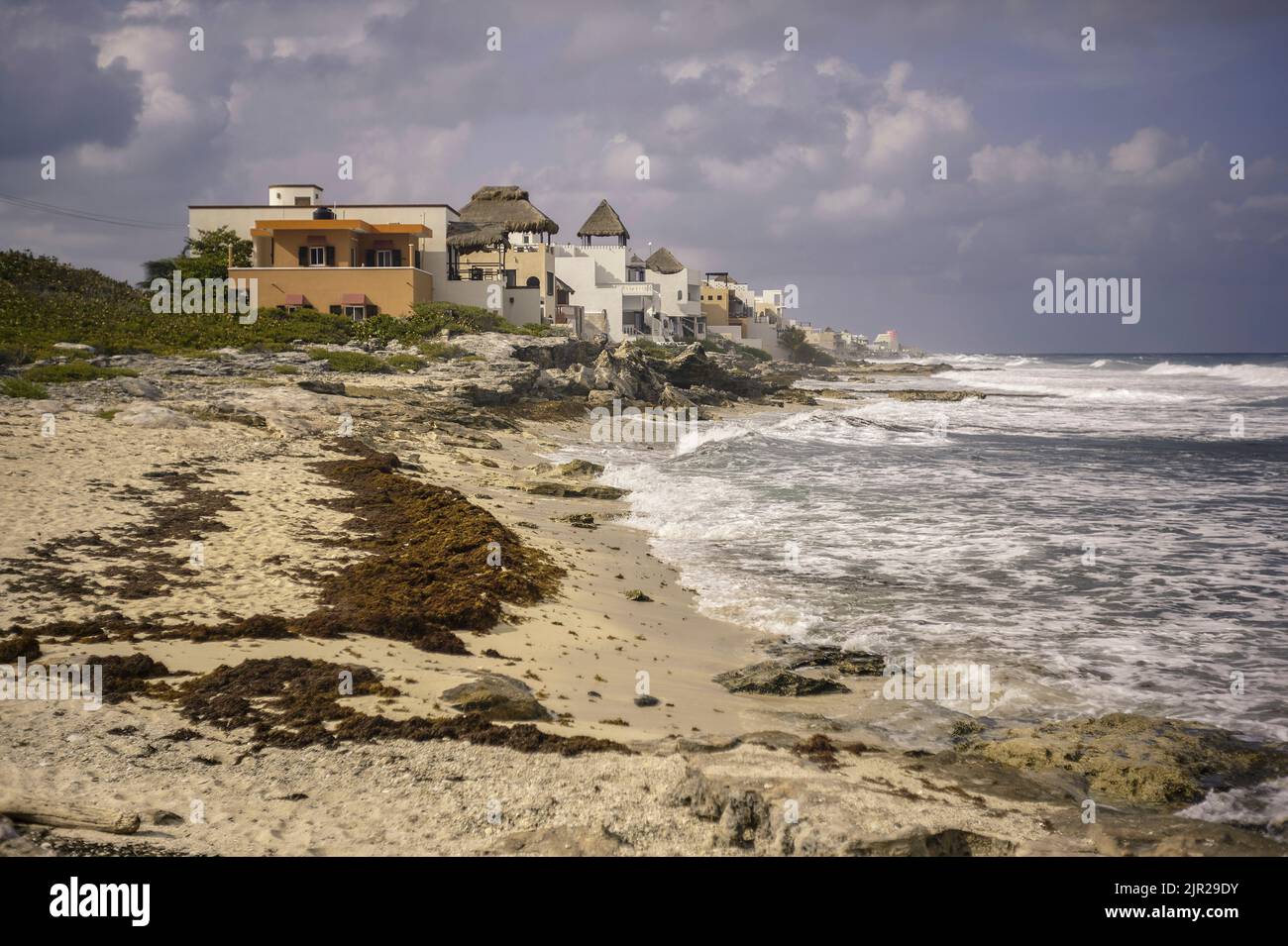 Small houses built on one of the beaches of Isla Mujeres in Mexico