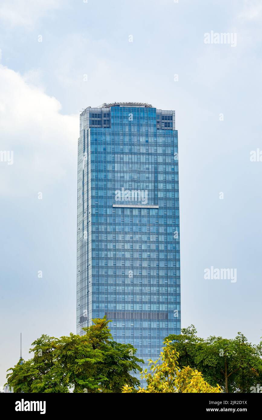 High-rise building with glass curtain wall in city business district ...