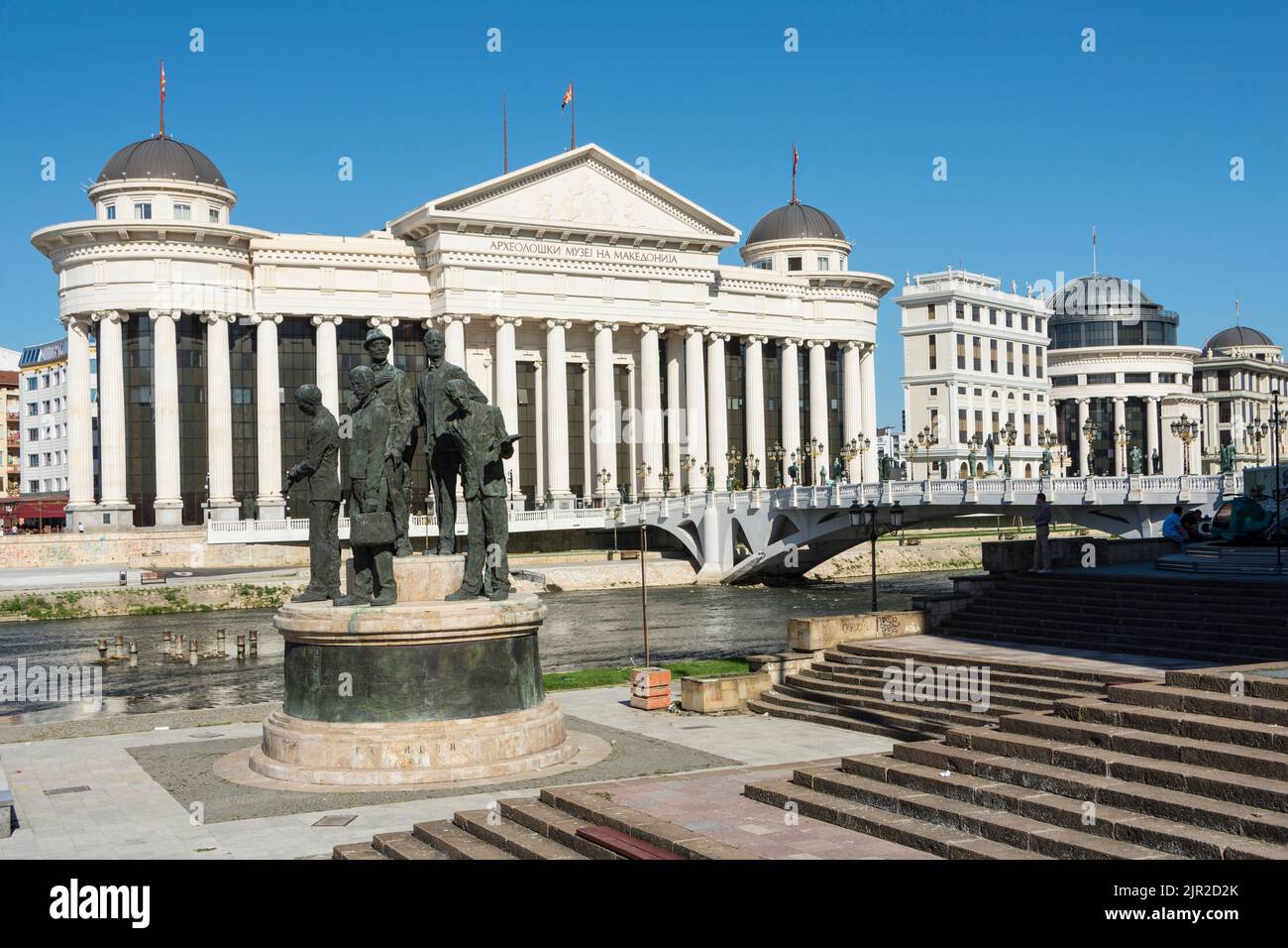 Monument in honour of the Gemidzhii (The Boatmen of Thessaloniki or the Assassins of Salonica) and the archaeological museum in Skopje,North Macedonia Stock Photo