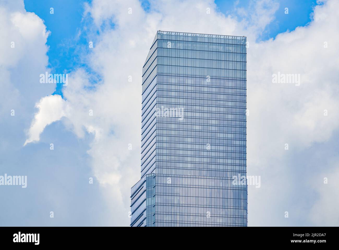 High-rise building with glass curtain wall in city business district ...