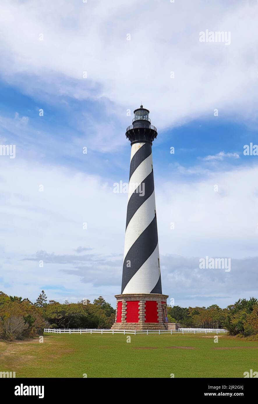The Cape Hatteras lighthouse tower near the town of Buxton on the Outer Banks of North Carolina vertical Stock Photo