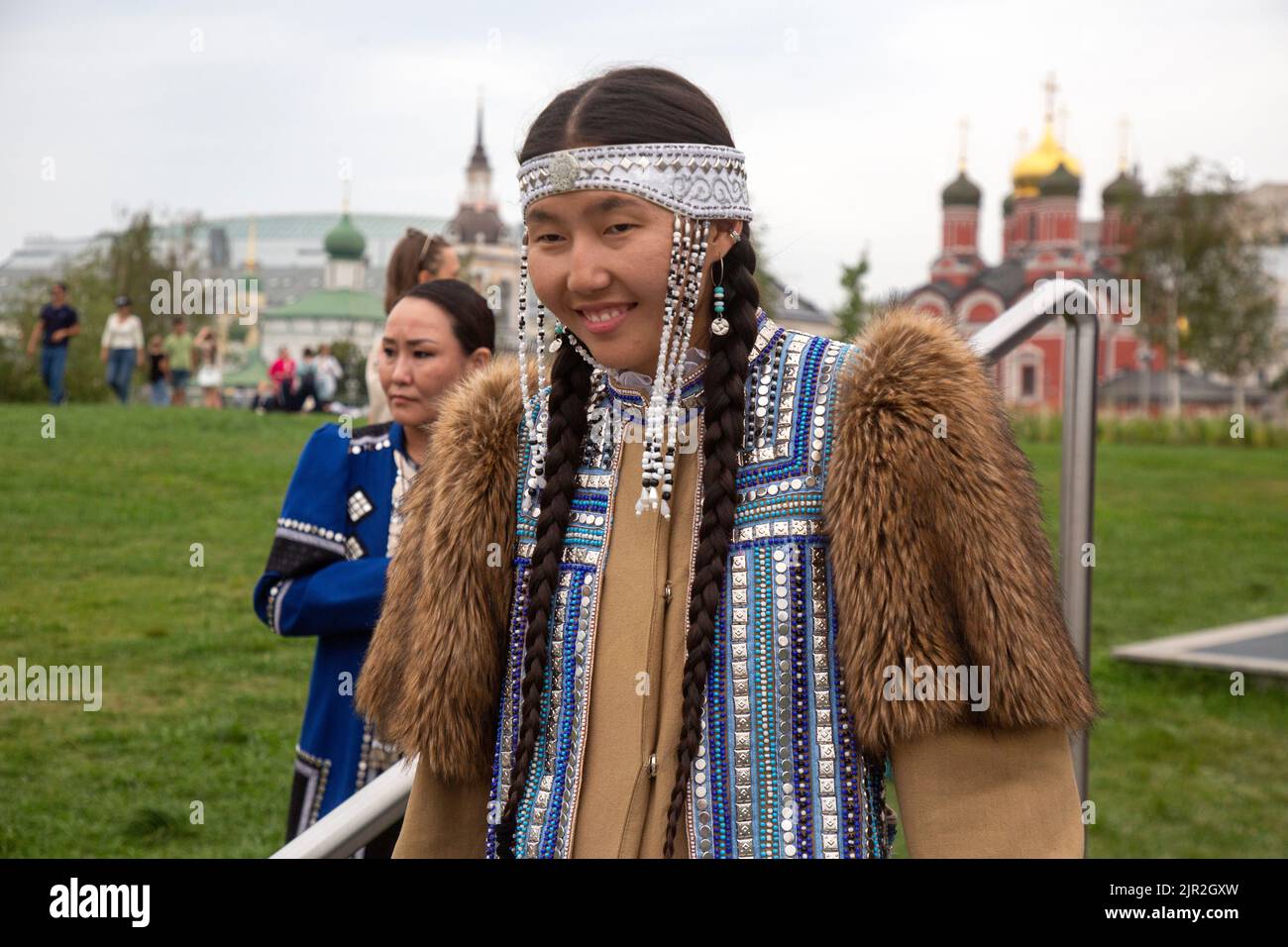 Moscow, Russia. 21th of August, 2022. A woman in national Yakut dress is seen on a site of the Russian Geographical Society Festival in Zaryadye Park in the center of Moscow, Russia Stock Photo