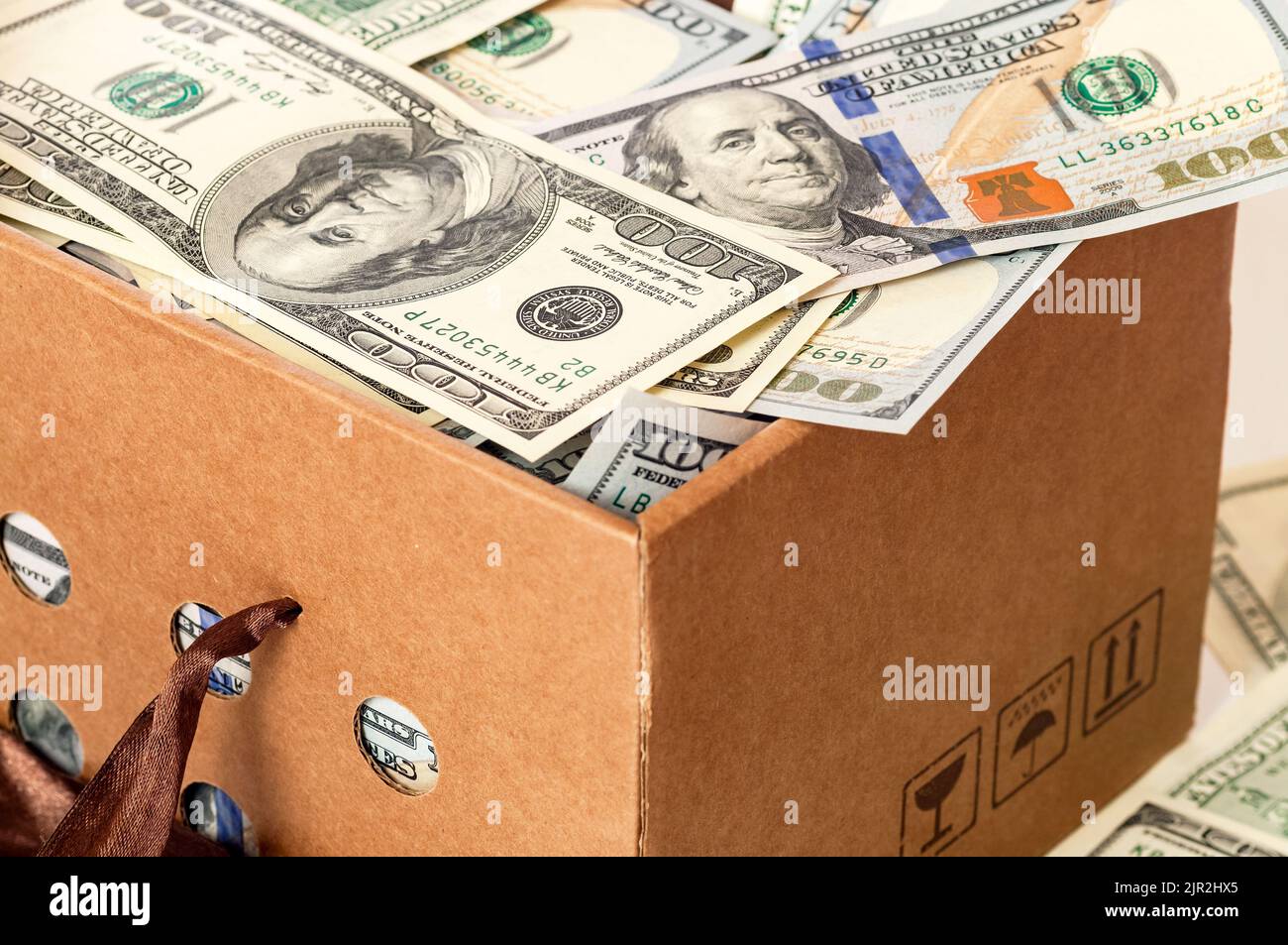 Box full american dollars hi-res stock photography and images - Alamy