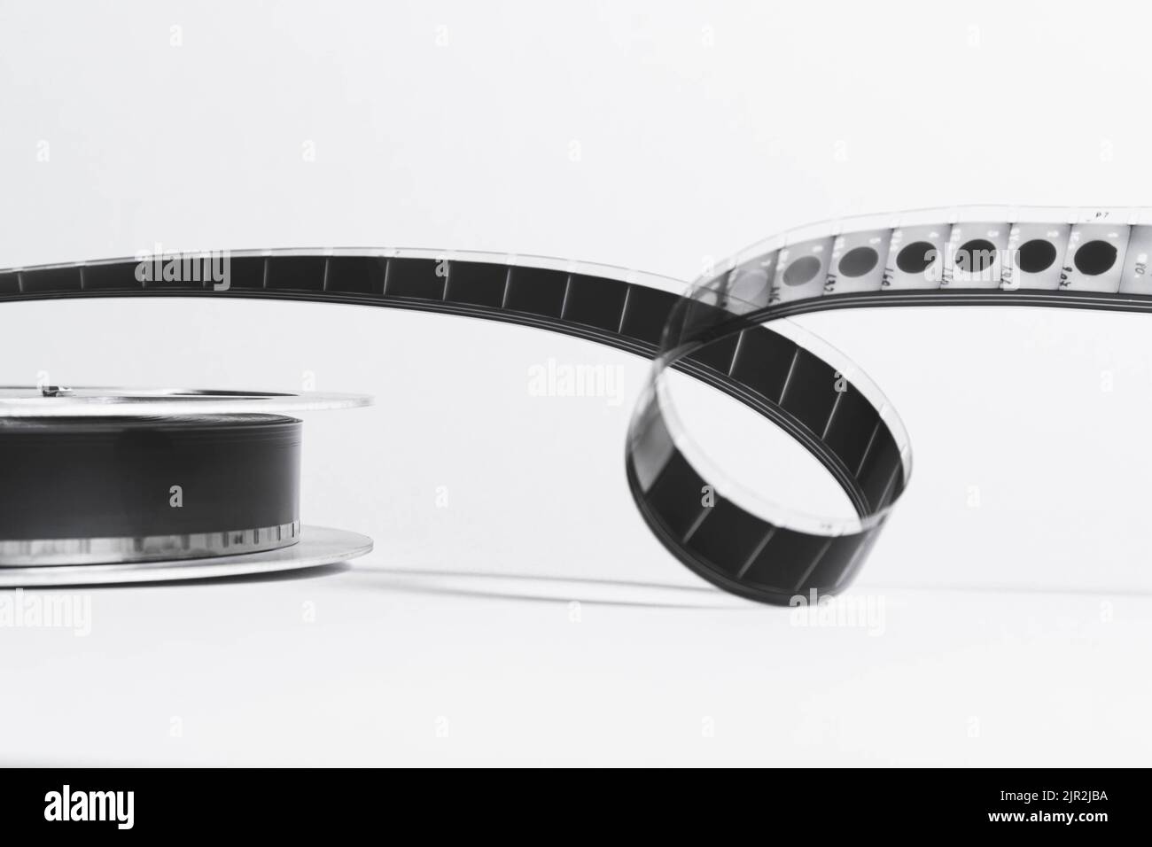 Vintage film strip isolated on white background. Film footage on film. Analog cinema. Old cinema