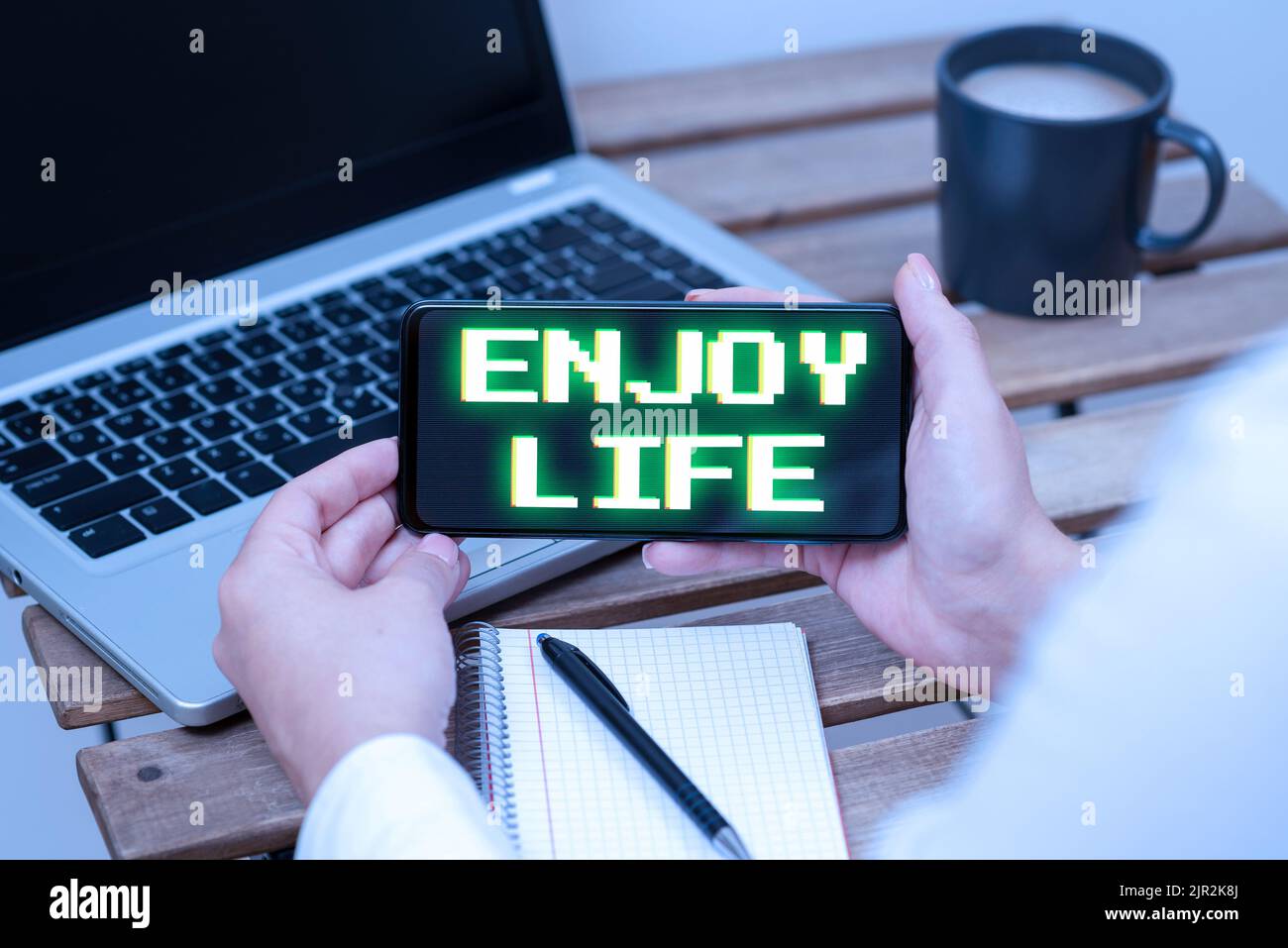 Conceptual display Enjoy Life. Business concept Any thing, place,food or person, that makes you relax and happy Sitting Businesswoman Holding Stock Photo