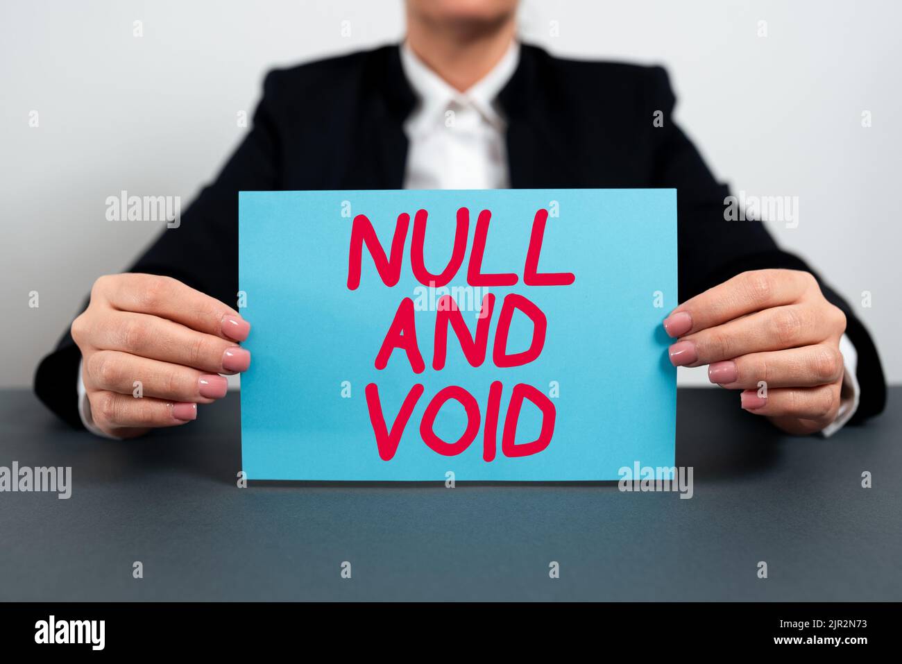 Text caption presenting Null And Void. Business overview Cancel a contract Having no legal force Invalid Ineffective Businesswoman Holding Note With Stock Photo