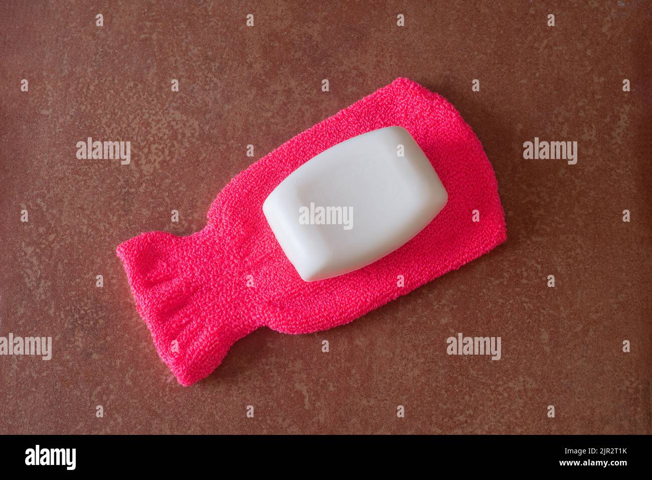 Washcloth And Soap As Symbol Photo For Water Saving And Shower