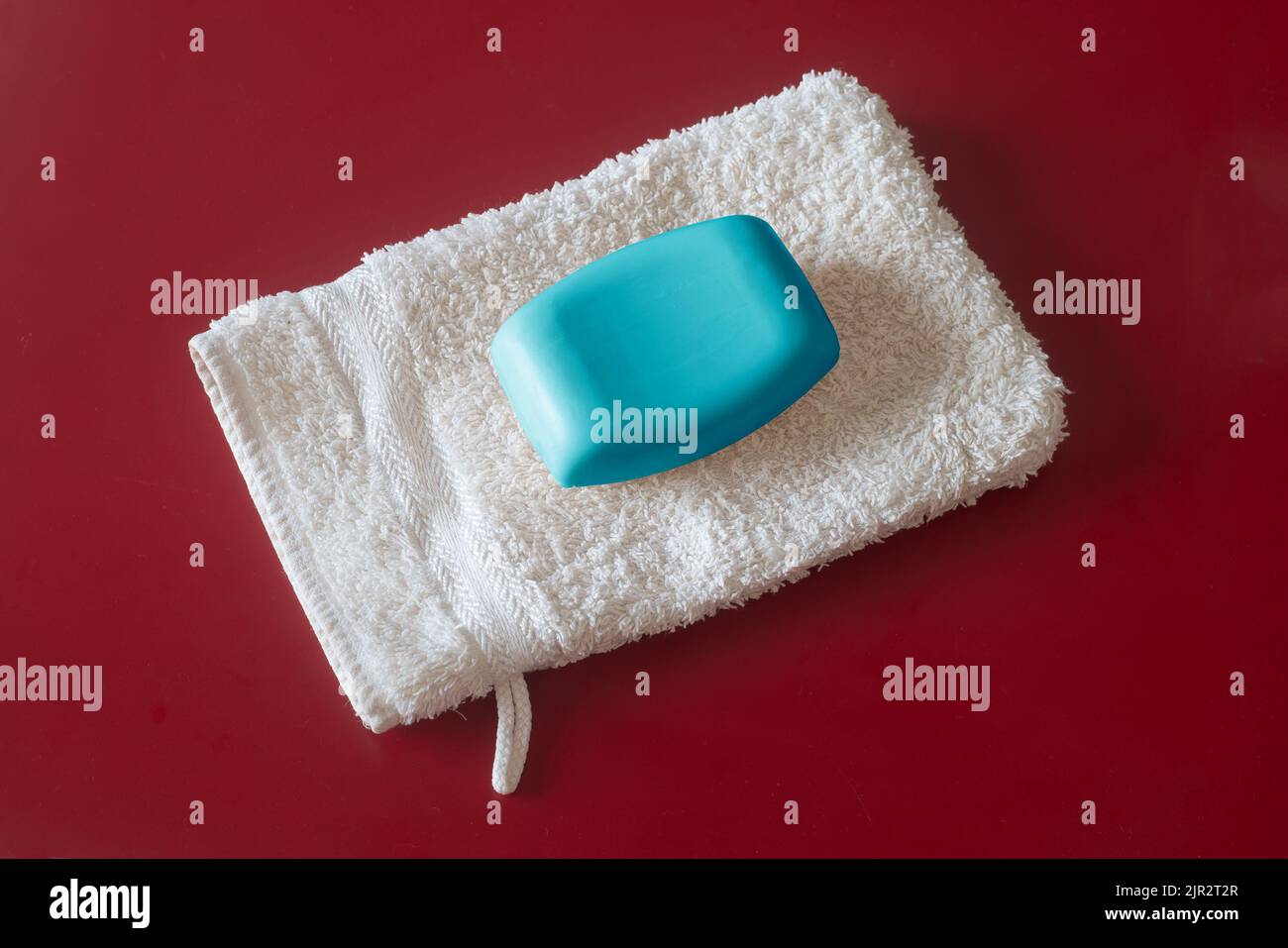 Washcloth And Soap As Symbol Photo For Water Saving And Shower