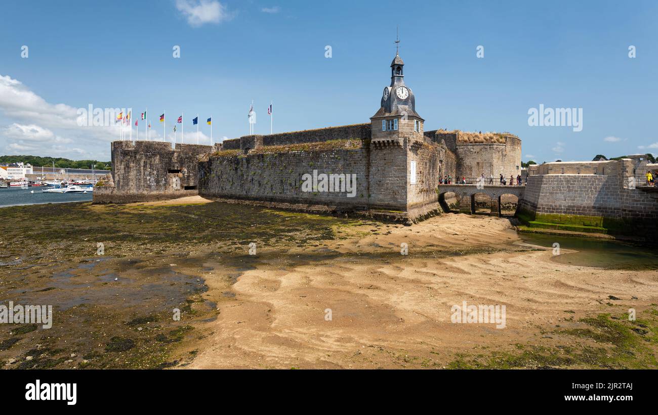 The medieval walled town of Concarneau at low tide in the summer. Stock Photo
