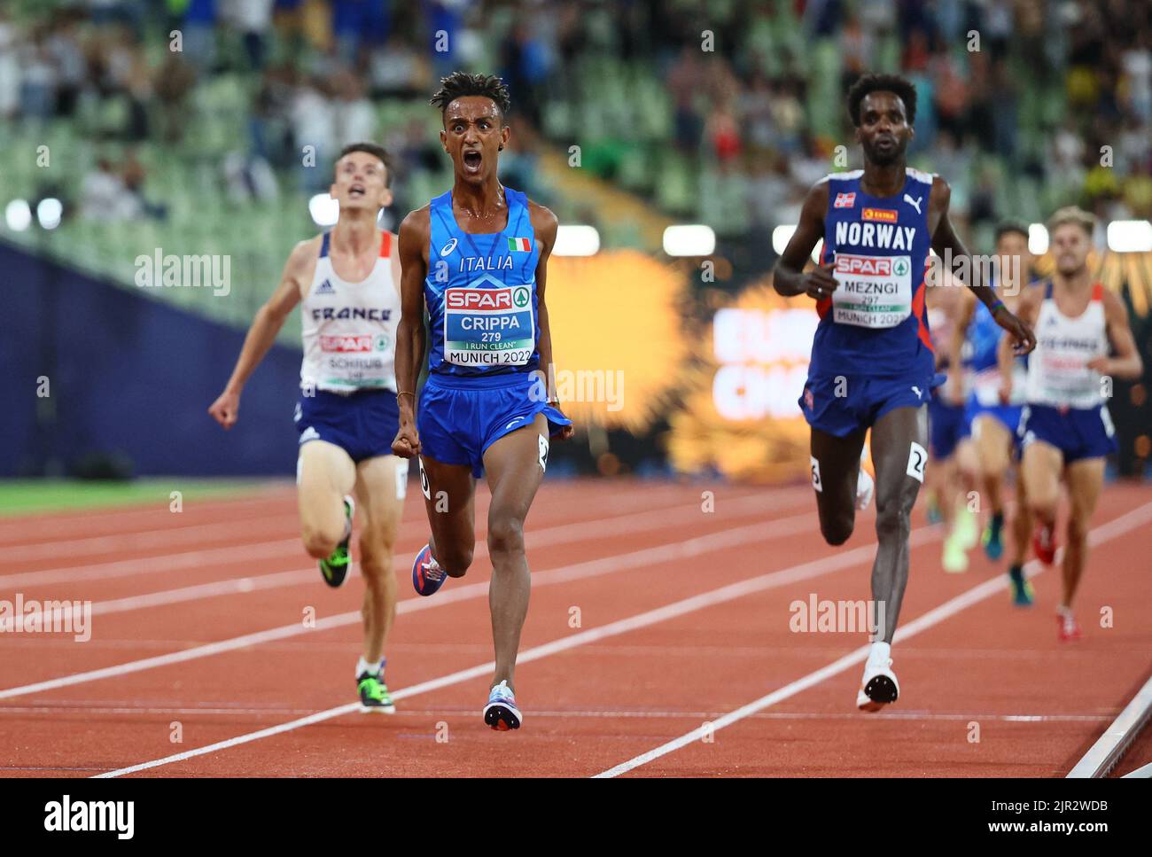 2022 European Championships - Athletics - Olympiastadion, Munich, Germany - August 21, 2022 Italy's Yemaneberhan Crippa celebrates after winning gold in the men's 10,000m final REUTERS/Wolfgang Rattay  REFILE - CORRECTING ID Stock Photo