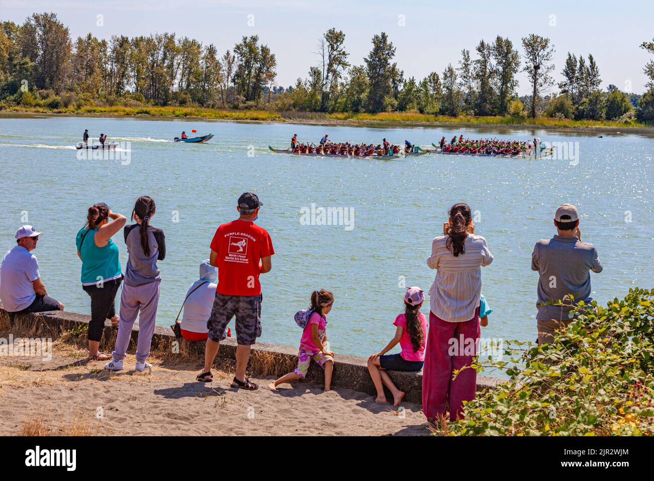 Spectators watching the 2022 Steveston Dragon Boat Festival in British Columbia Canada Stock Photo