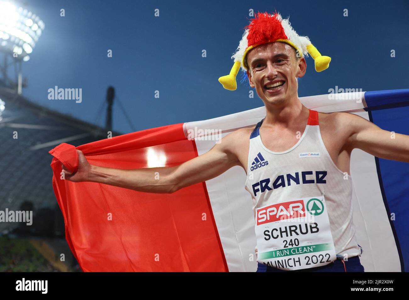 2022 European Championships - Athletics - Olympiastadion, Munich, Germany - August 21, 2022 France's Yann Schrub celebrates after winning bronze in the men's 10,000m final REUTERS/Wolfgang Rattay Stock Photo