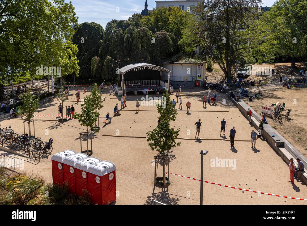 People playing petanque in Bonn on a bright summer day Stock Photo