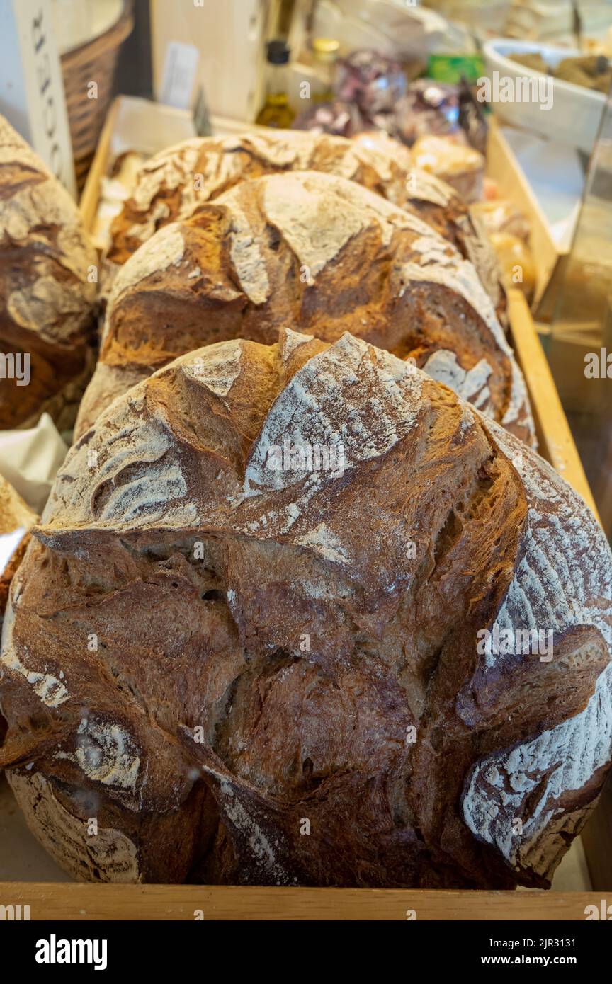 Oven baked fresh sour dough organic bread in bakery Stock Photo Alamy