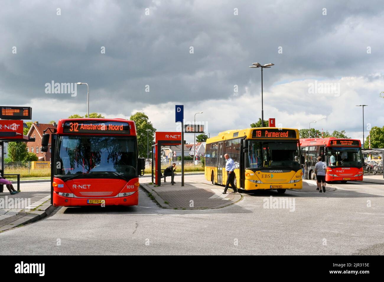 Edam, Netherlands - August 2022: Buses waiting to depart the town's bus station. Stock Photo