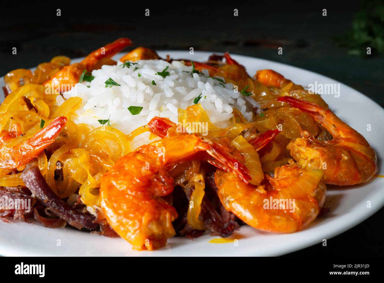 Brazilian typical local food, rice with jerked beef and dry shrimps ...