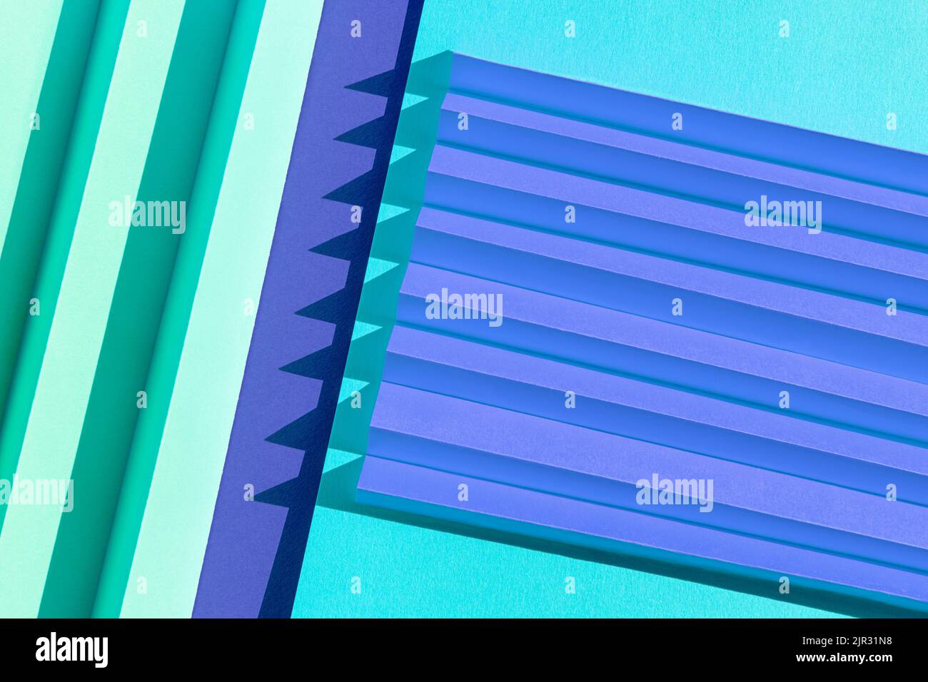 Abstract different blue colored paper texture. Folded paper with harsh