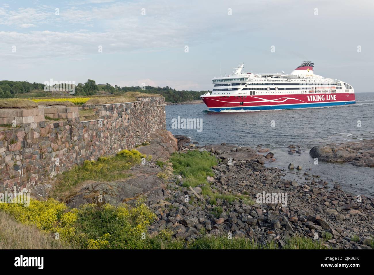 Cruiseferry Viking XPRS of Viking Line going to the port of Helsinki near Suomenlinna fortress in Helsinki, Finland, the UNESCO World Heritage site Stock Photo