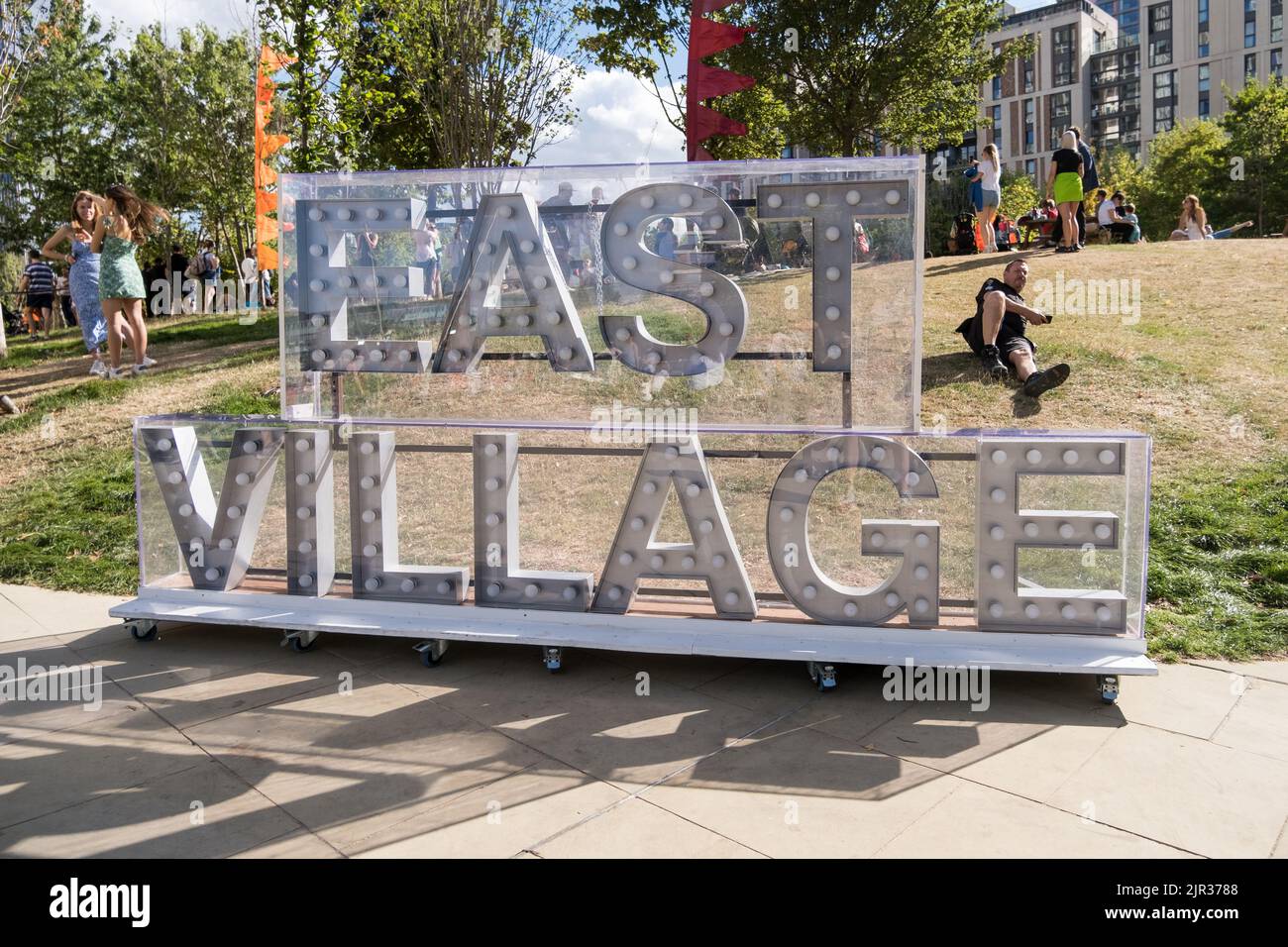 East Village Sign (London) in the park during the E20 Summer Fete celebrating the 10 year anniversary marking the London 2012 Olympics. Stock Photo