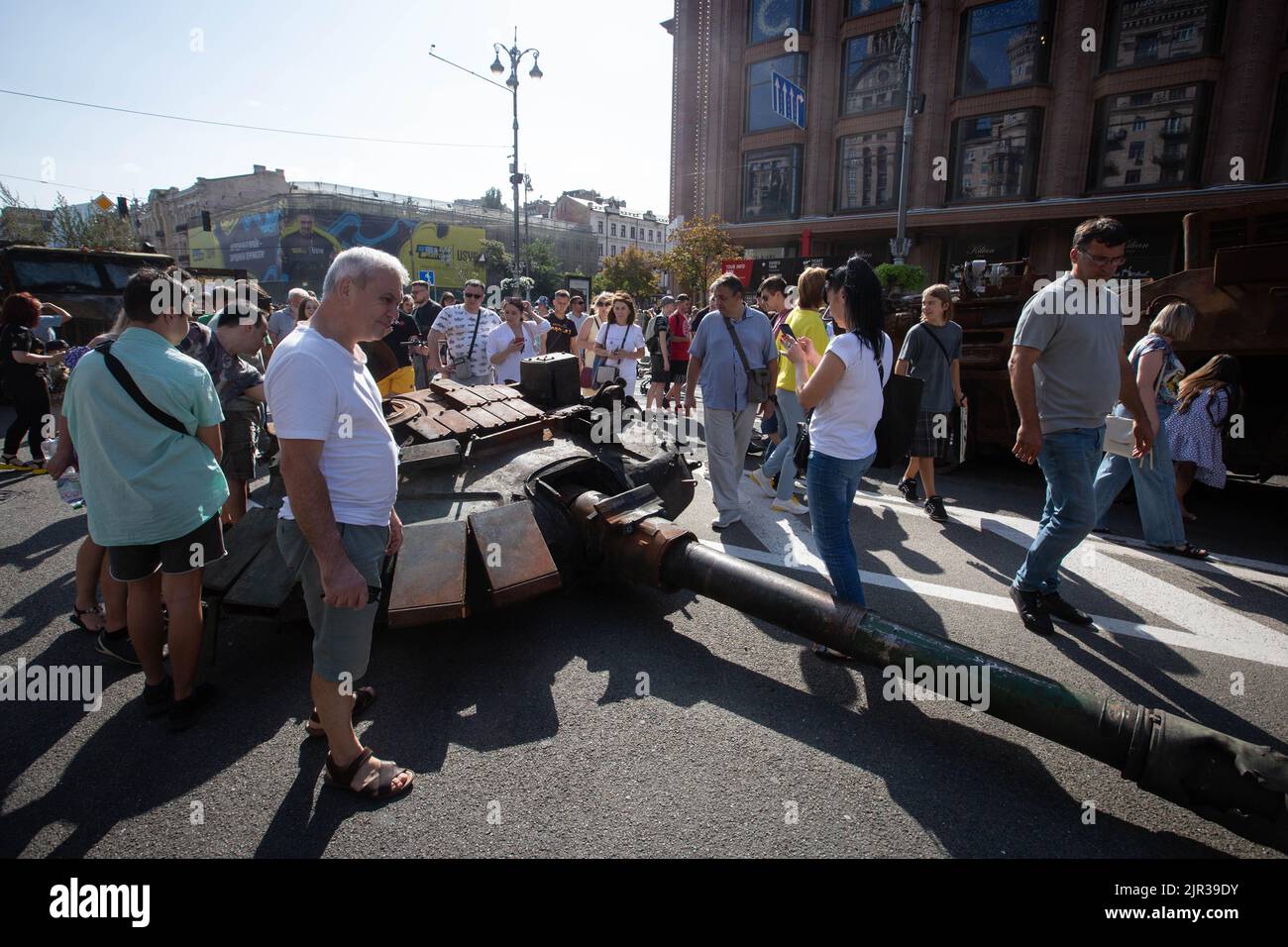 People look at the cannon of a destroyed Russian tank displayed on the main street Khreshchatyk as part of the upcoming celebration of the Independence Day of Ukraine amid Russia's invasion of Ukraine in central Kyiv. Stock Photo
