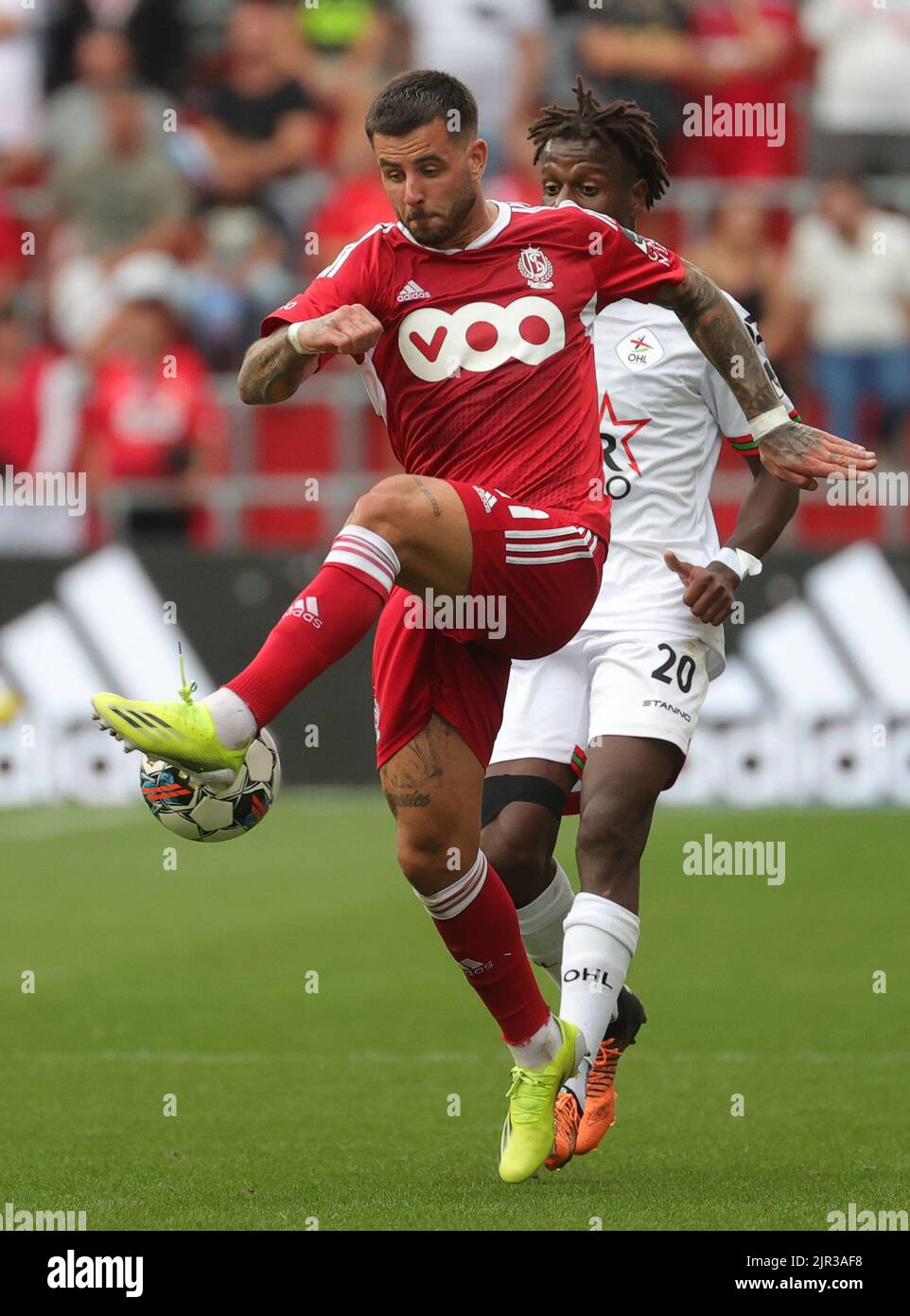 Liege, Belgium, 21 August 2022, Standard's Aron Donnum and OHL's Hamza