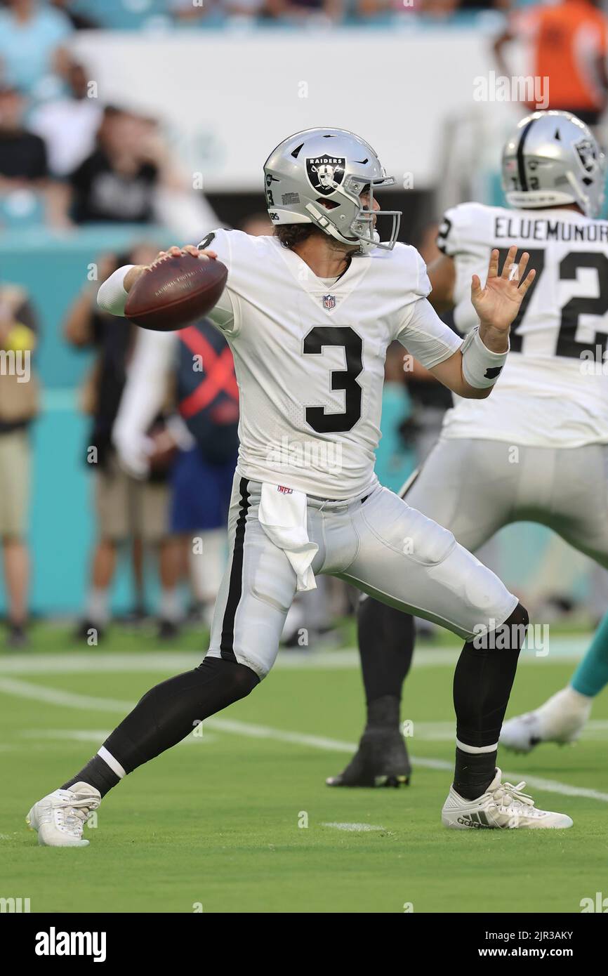 Miami. FL USA;  Las Vegas Raiders quarterback Jarrett Stidham (3) drops back t pass during an NFL preseason game against the Miami Dolphins, Saturday, Stock Photo