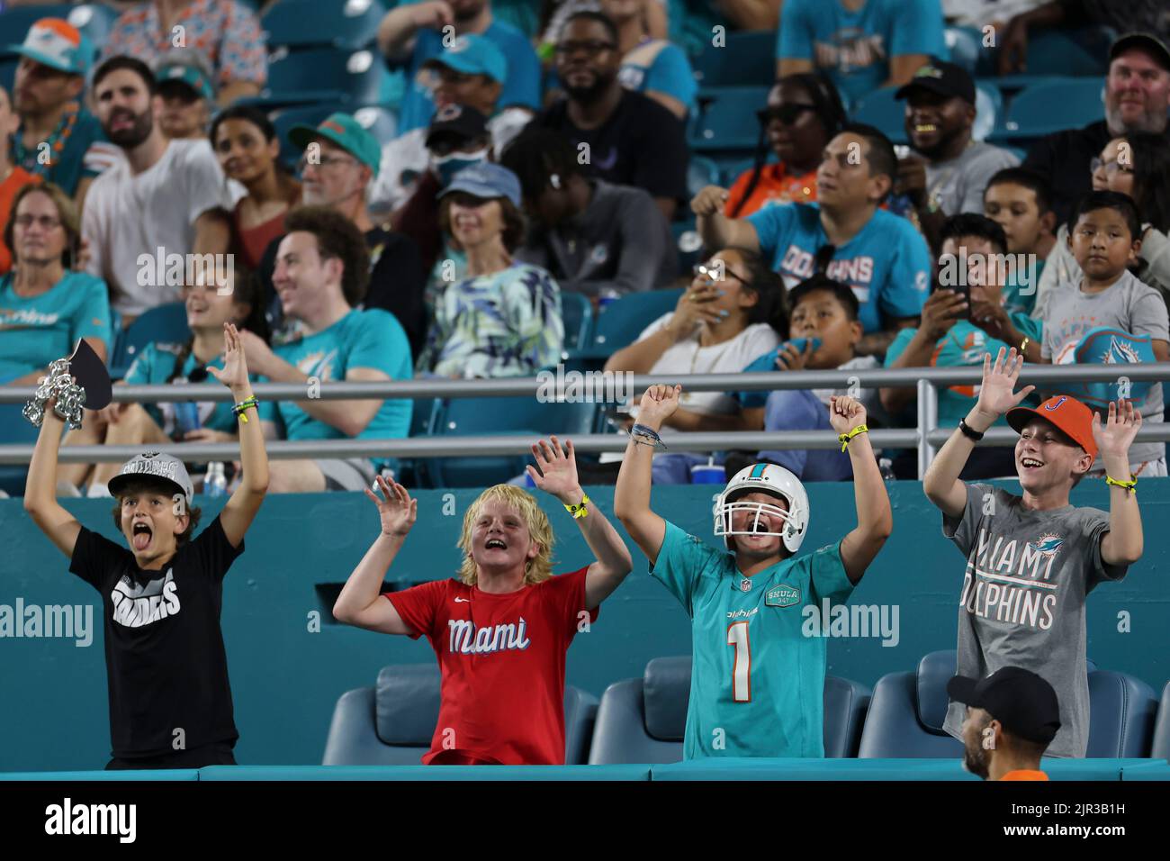 Miami. FL USA;  Young Miami Dolphins fans were enjoying the excitement during an NFL preseason game against the Las Vegas Raiders, Saturday, August 20 Stock Photo