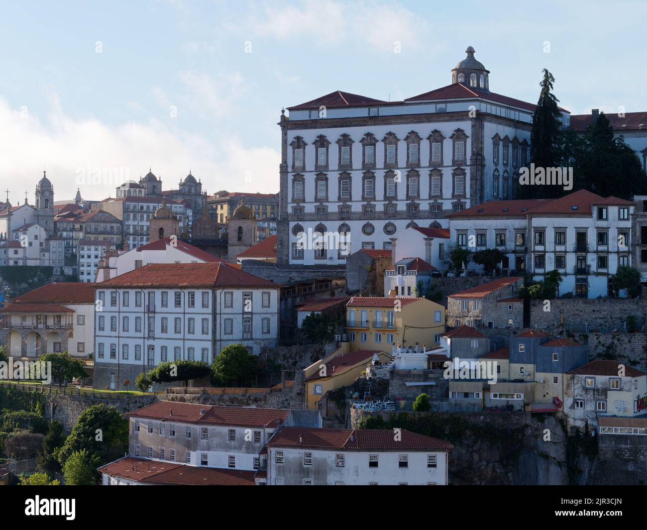 Close up of buildings above the Ribeira district in Porto Portugal, on a summers evening showing the terraced hilly nature of the city. Stock Photo