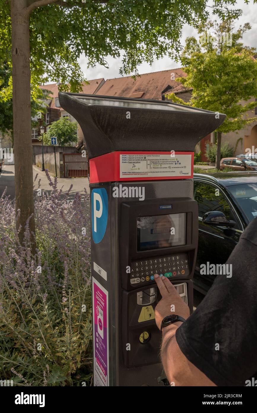 Parking ticket machine in parking lot, Haguenau , Alsace, France Stock Photo