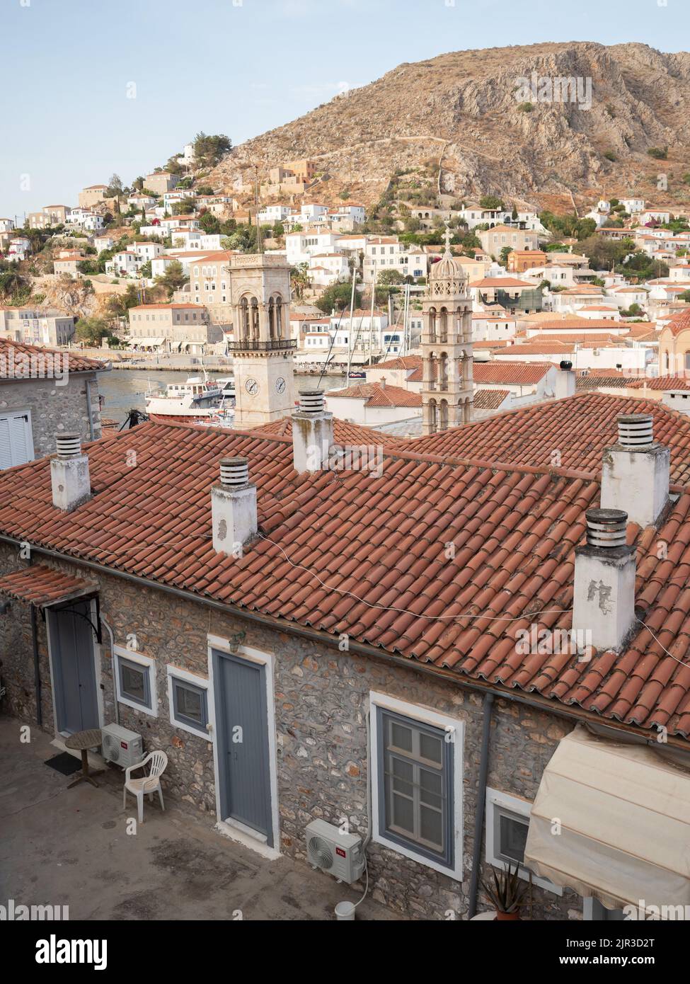 View of Greek island, terracotta roof, town and mountain Stock Photo Alamy