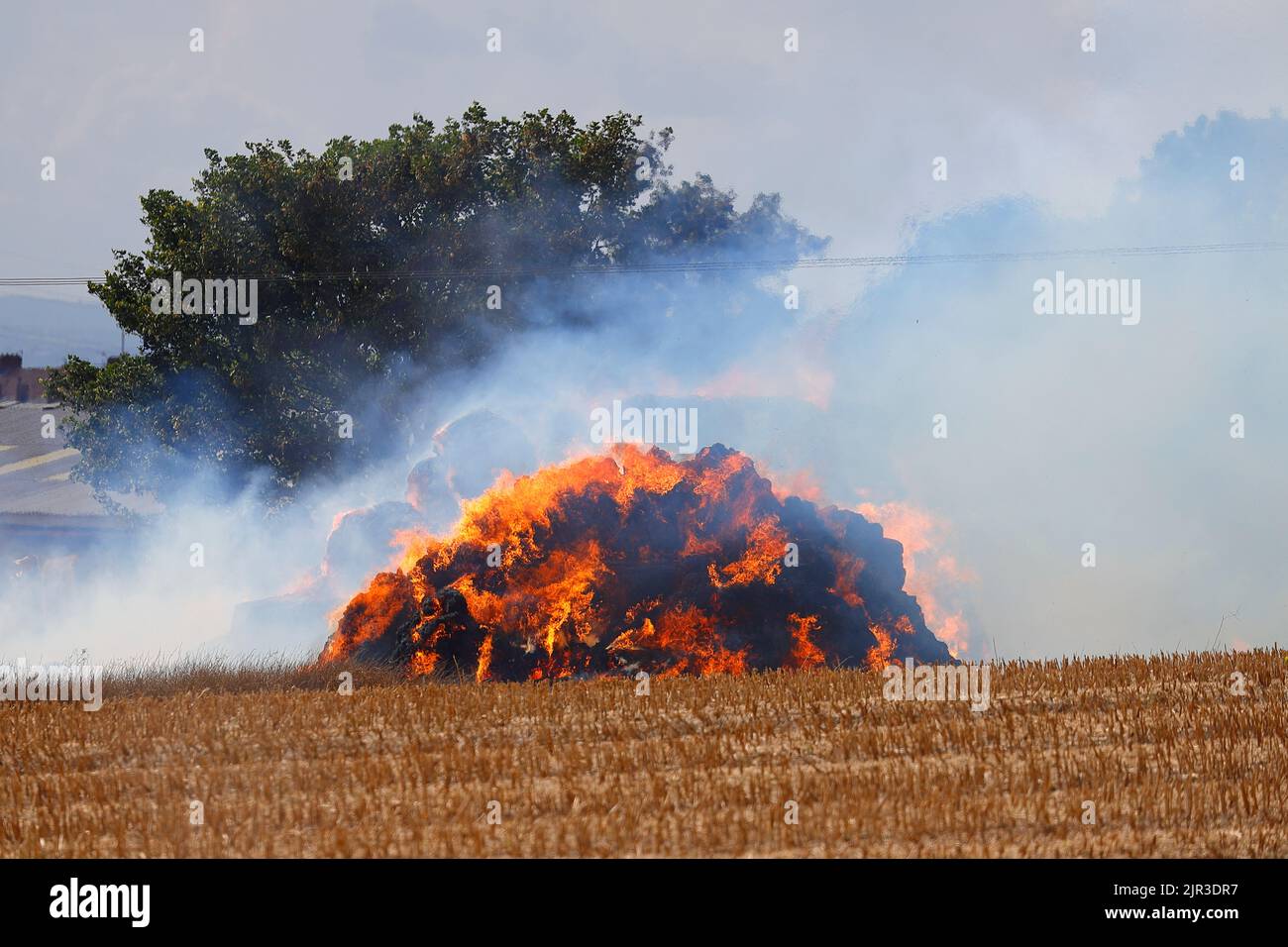 Hay bales on fire at a farm in Little Preston near Leeds,West Yorkshire