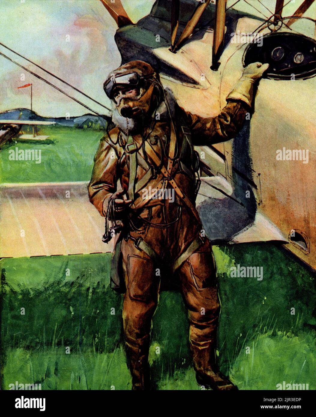 Halftone of a pilot ready to take off in a biplane during World War Two, published 1942. Stock Photo