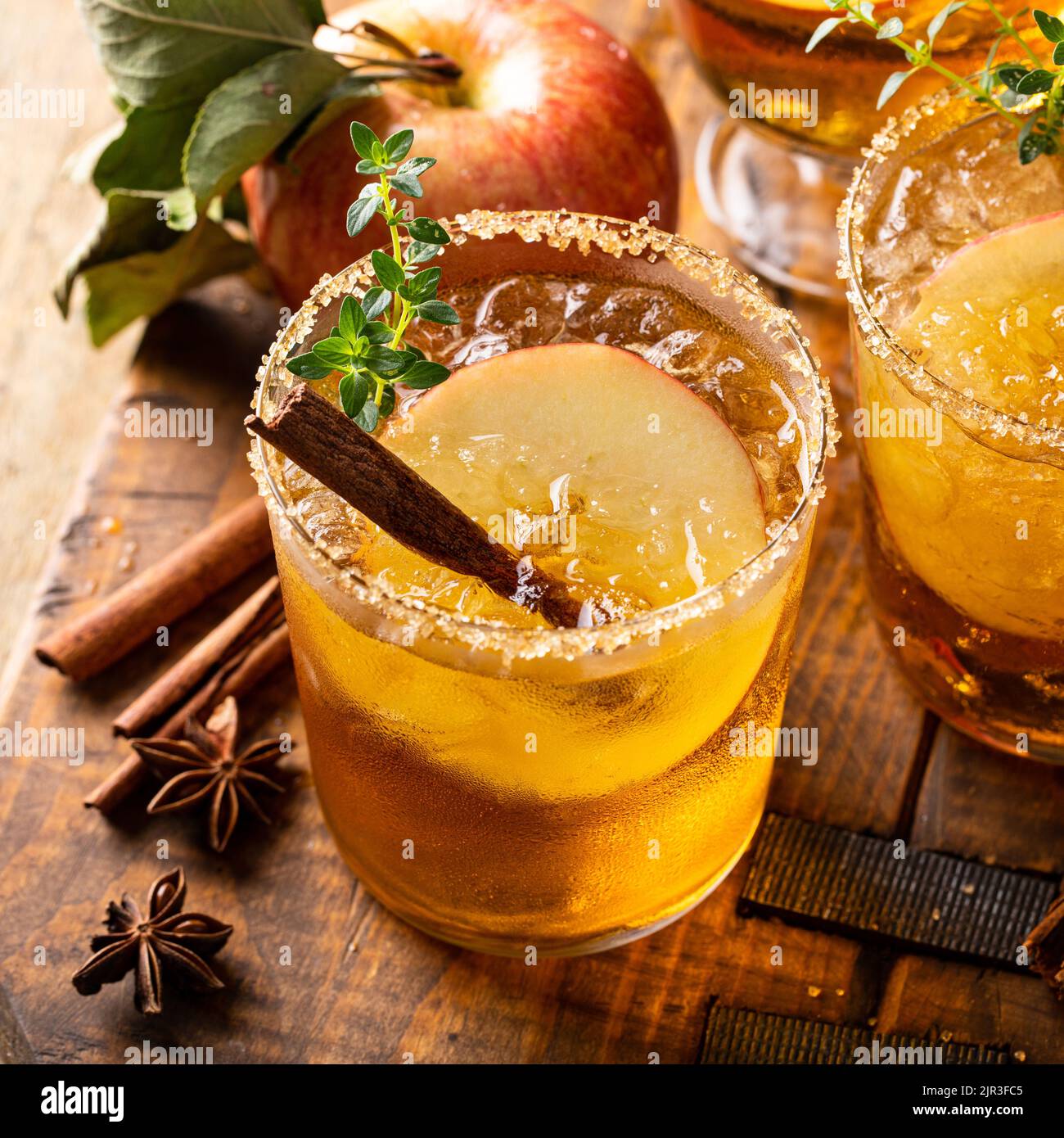 Apple cider margarita with brown sugar rim and cinnamon stick Stock