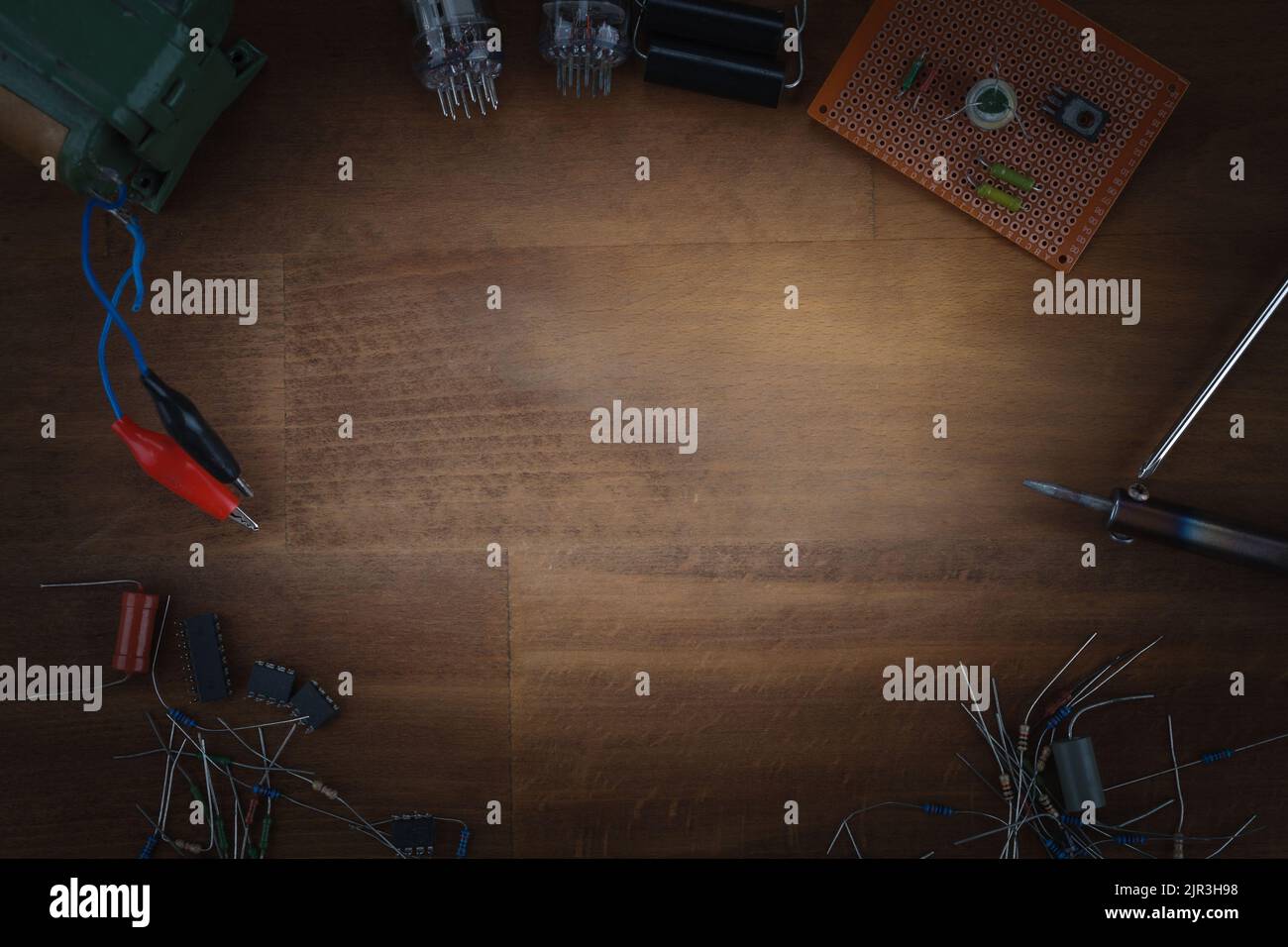 DIY do it yourself workplace with soldering iron, tools and