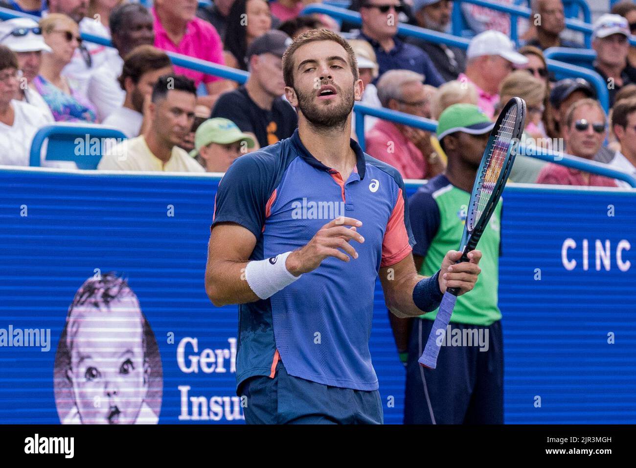 Mason, Ohio, USA. 21st Aug, 2022. Boma Coric (Cro) reacts to a shot during championship match of the Western and Southern Open at the Lindner Family Tennis Center, Mason, Oh. (Credit Image: © Scott Stuart/ZUMA Press Wire) Stock Photo