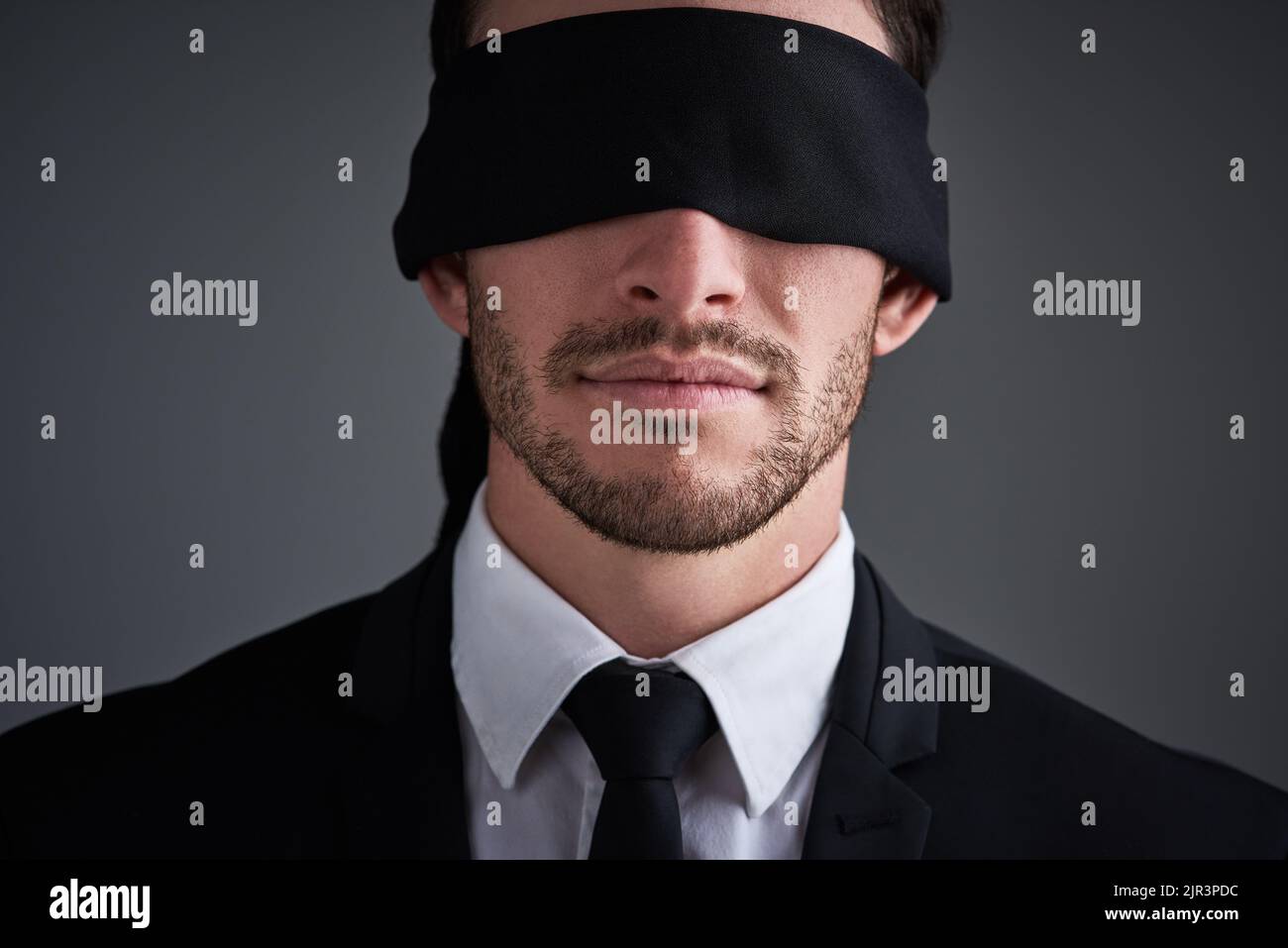 Blindfolded elegant man Stock Photo by ©brasoveanub 44815667