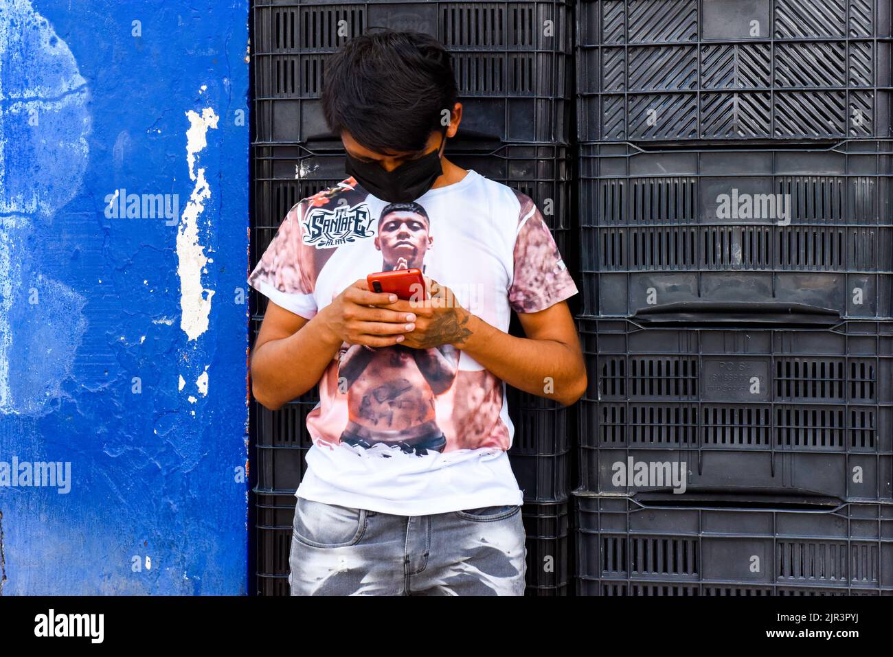 Mexican teen with mobile phone, Merida Mexico Stock Photo