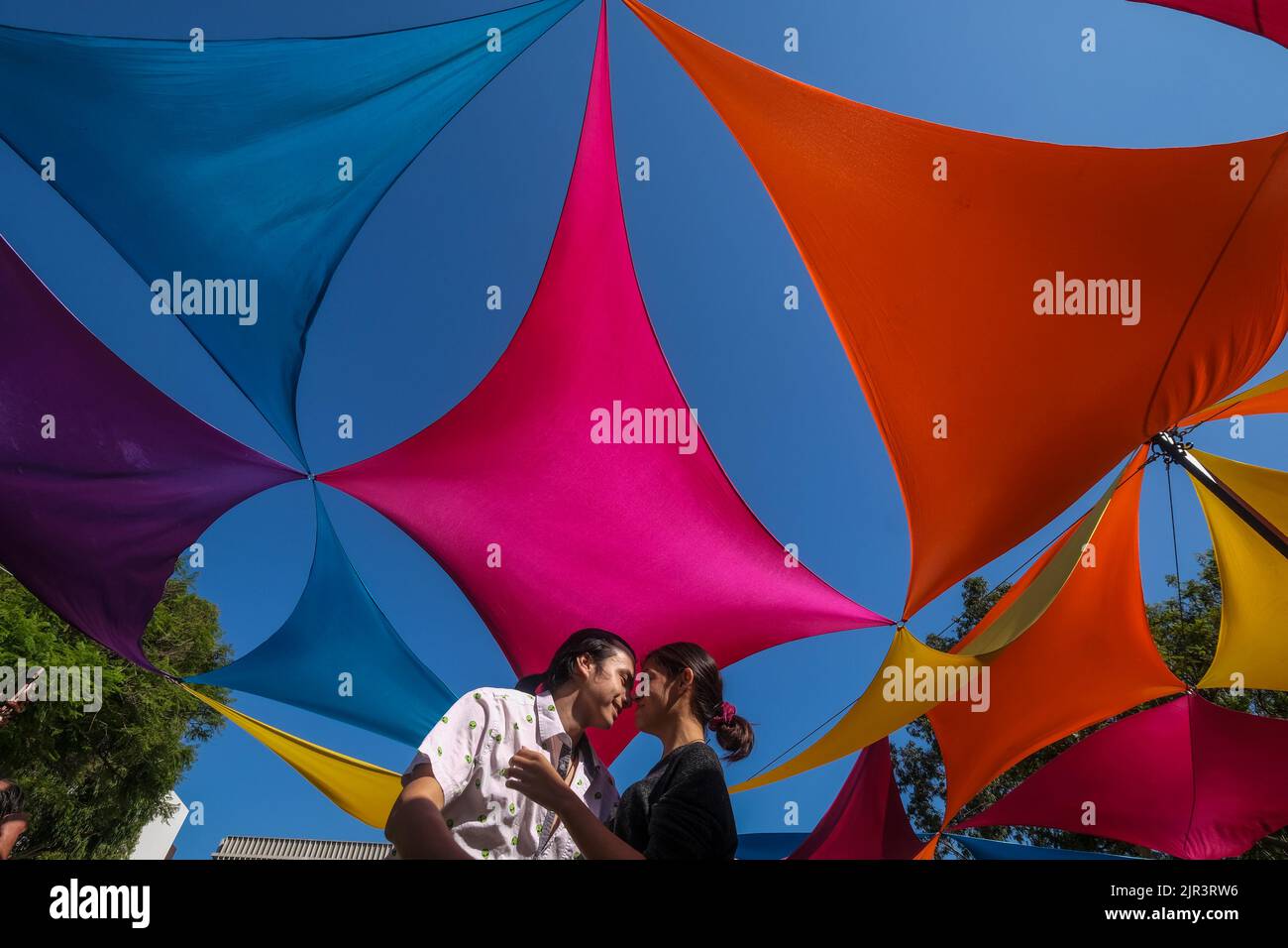 Los Angeles, California, USA. 21st Aug, 2022. A couple dance in the ''Grand Park's Sunday Sessions'' event, a summer dance party sponsored by The Music Center, Sunday Aug. 21, 2022, in downtown Los Angeles. (Credit Image: © Ringo Chiu/ZUMA Press Wire) Stock Photo