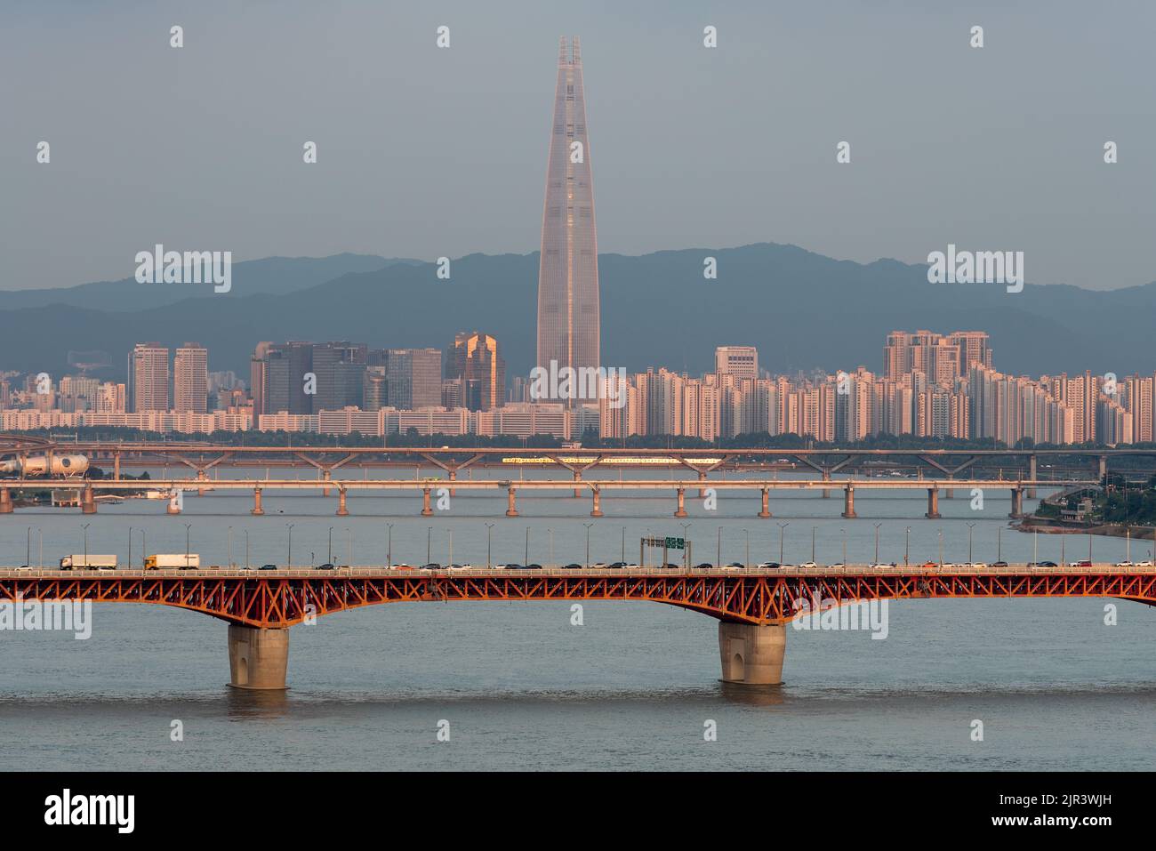Panoramic sunset view of Lotte World Tower skyscraper and Han River in Seoul South Korea on 19 August 2022 Stock Photo