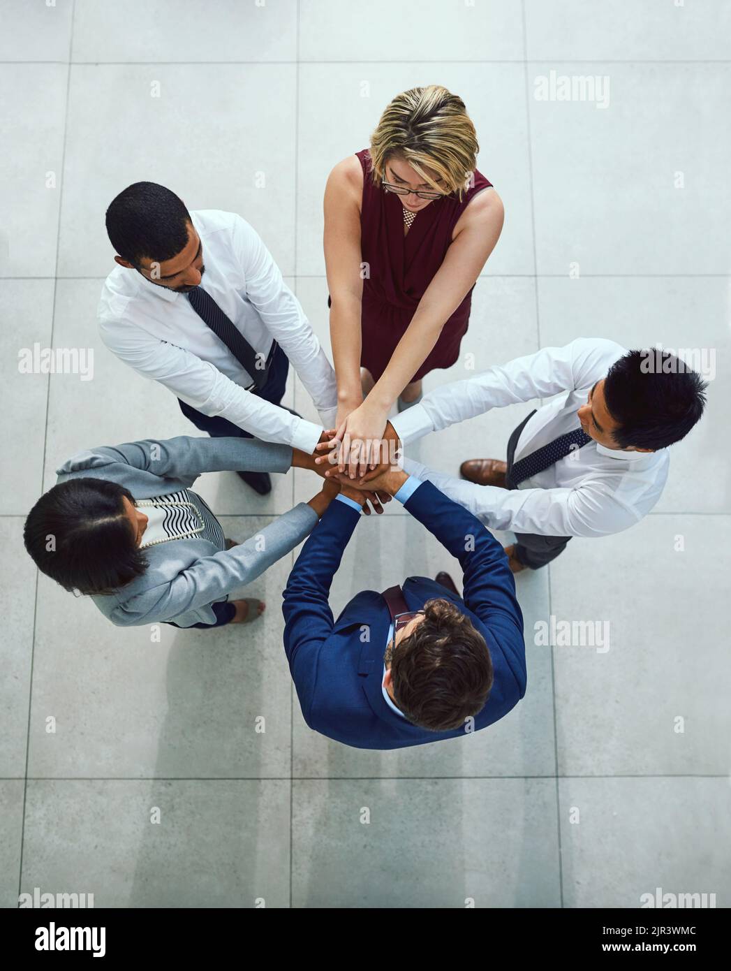 Group of diverse hands together joining hi-res stock photography and ...