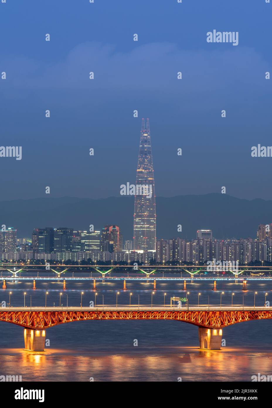 Night view of Lotte World Tower skyscraper and Han River in Seoul South Korea on 19 August 2022 Stock Photo