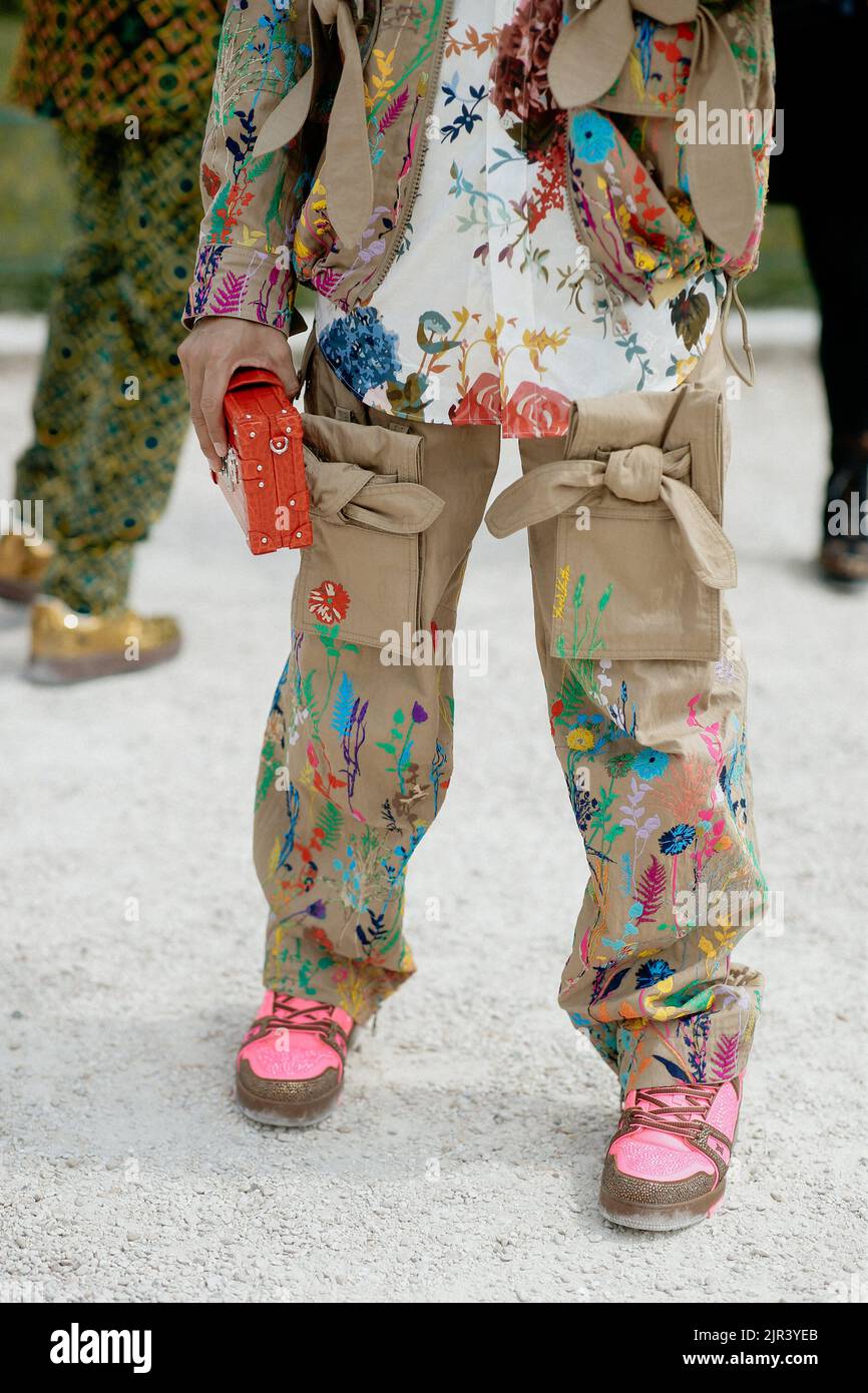 Street style, close up at Louis Vuitton Spring-Summer 2023 Menswear show,  held at Louvre Cour Carree, Paris, France, on June 23, 2022. Photo by  Marie-Paola Bertrand-Hillion/ABACAPRESS.COM Stock Photo - Alamy