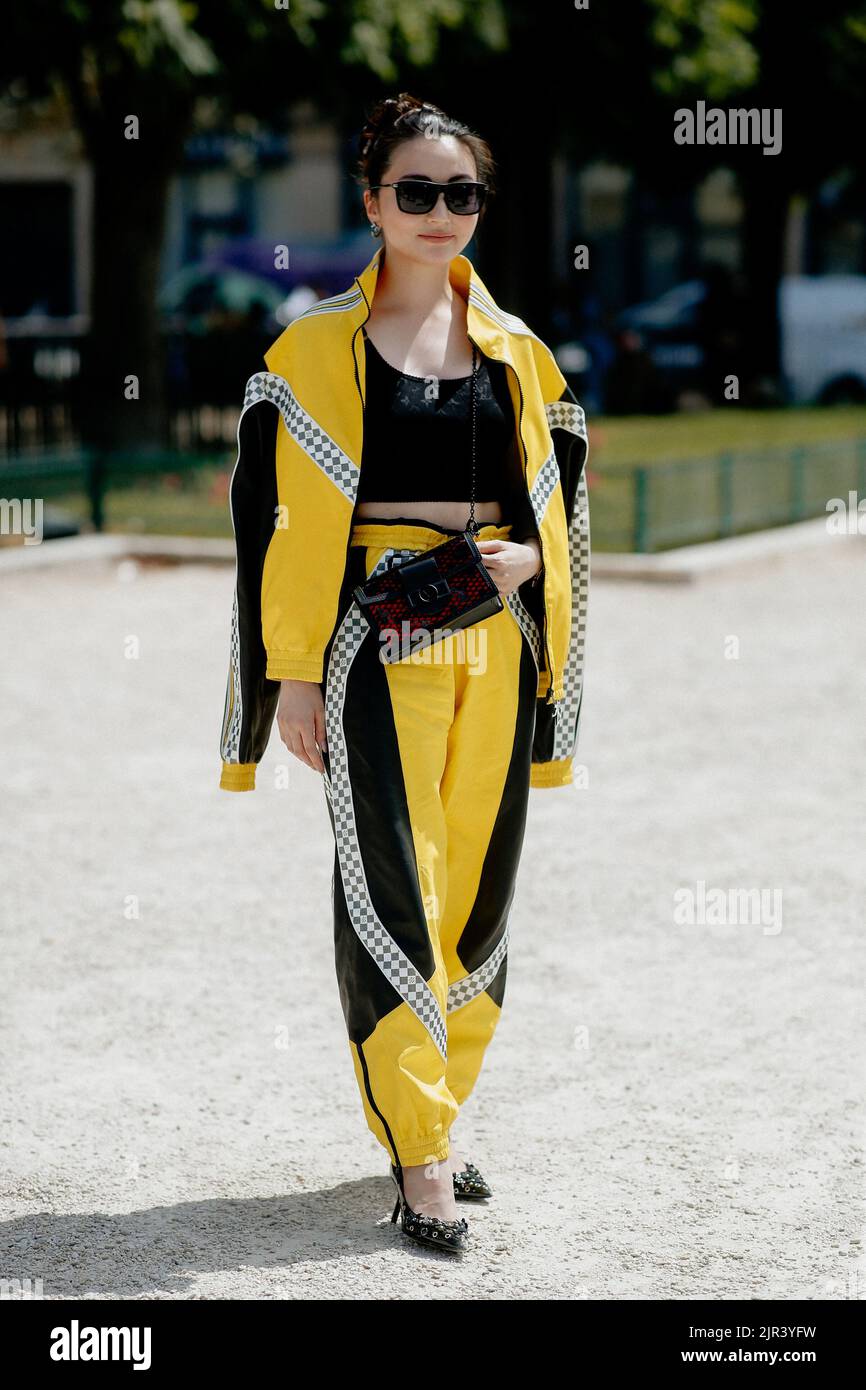 Street style, Thao Nhile arriving at Louis Vuitton Spring Summer 2023 show,  held at Musee du Louvre, Paris, France, on October 4, 2022. Photo by  Marie-Paola Bertrand-Hillion/ABACAPRESS.COM Stock Photo - Alamy
