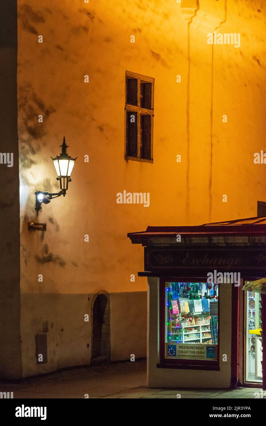 Money exchange and collector´s coins kiosk at Saiakang street in Old towwn at night in Tallinn Estonia Stock Photo