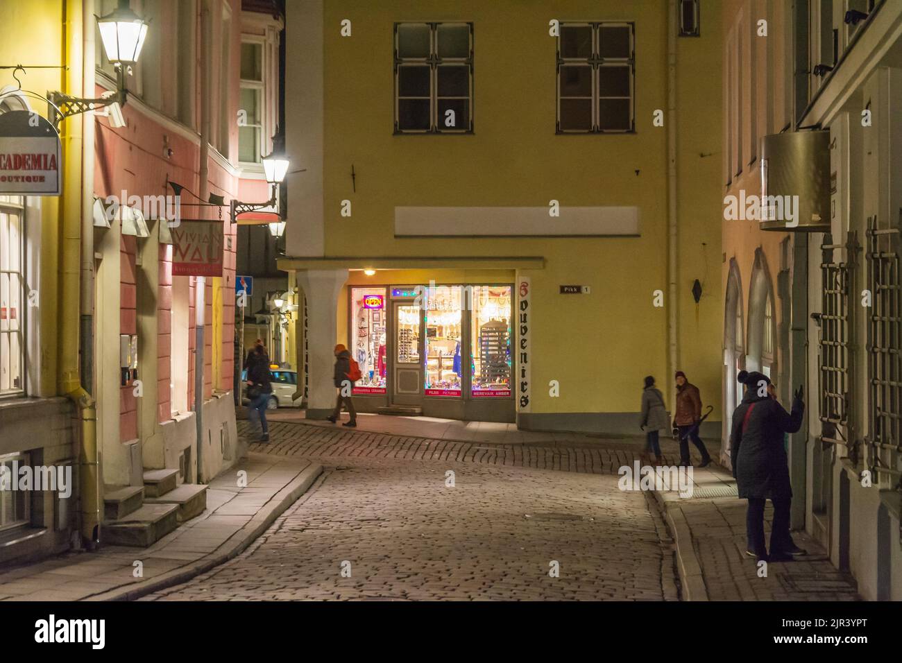 Souvenirs shop on Pikk street at night in Old town of Tallinn Estonia Stock Photo
