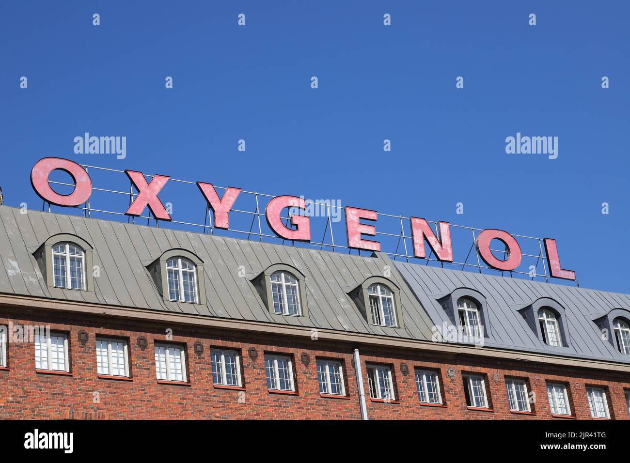 Helsinki, Finland - August 20, 2022: Close-up view of the  advertising sign for Oxygenol on the roof of a building on Hameentie street. Stock Photo